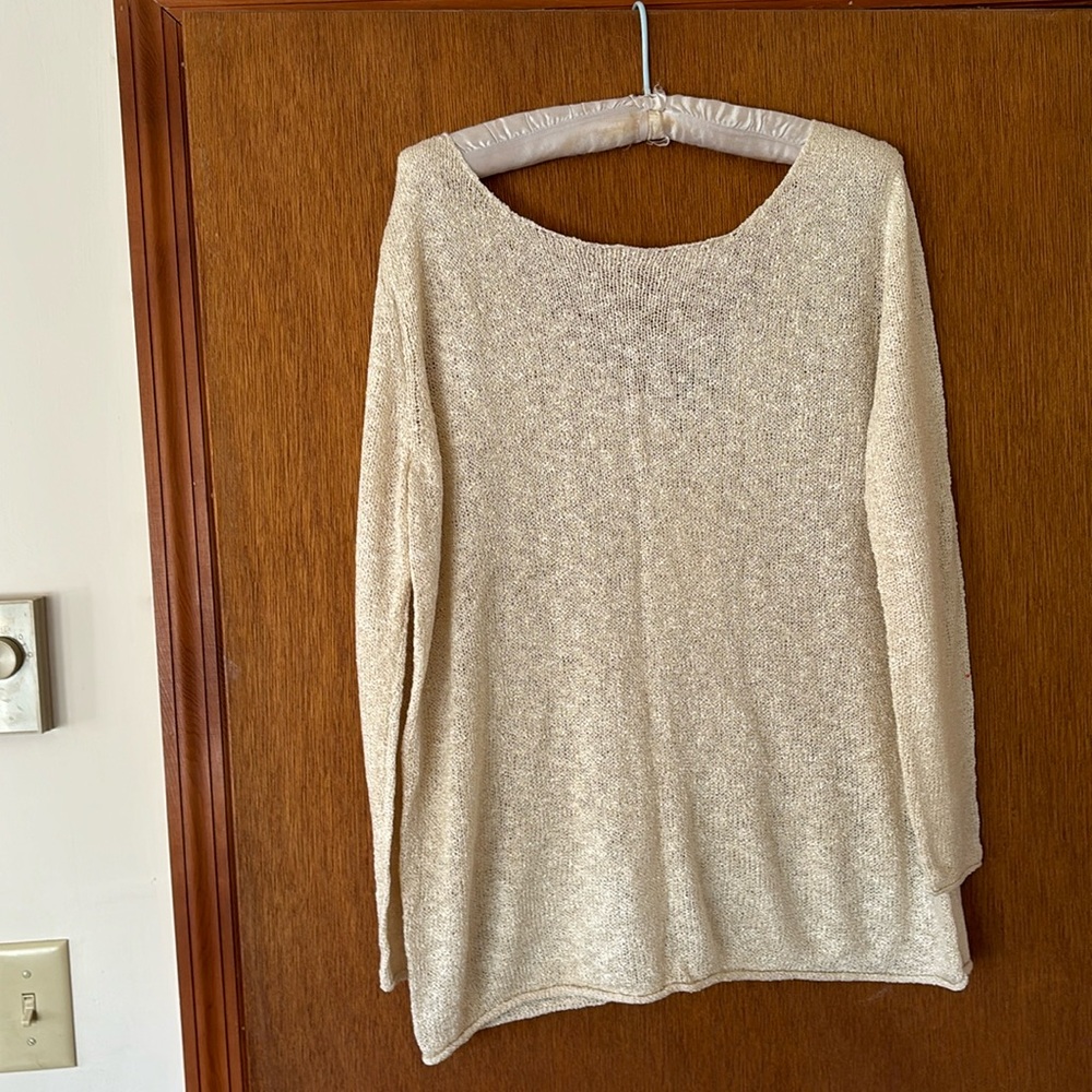 New Zara top. Slightly sheer with a sheen. V in back. Loose fit, size large.